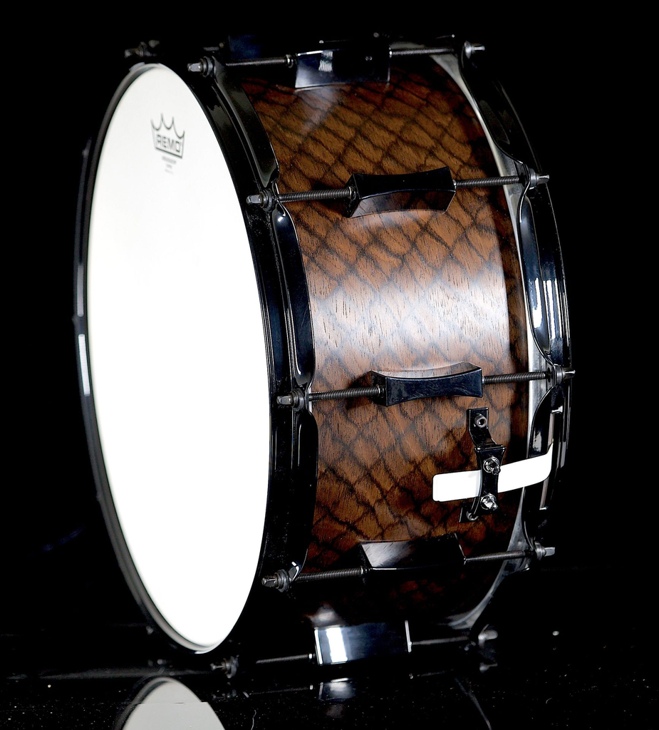 PORK_PIE_PERCUSSION_7_X_14_8_PLY_MAPLE_SNAKE_SKIN_VENEER_W_BLACK_HARDWARE-68d200b9c5b2c.webp